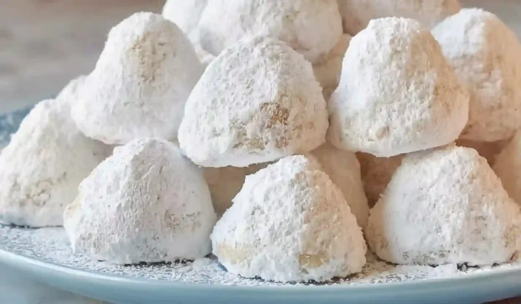 Greek kourabiedes almond cookies coated with powdered sugar
